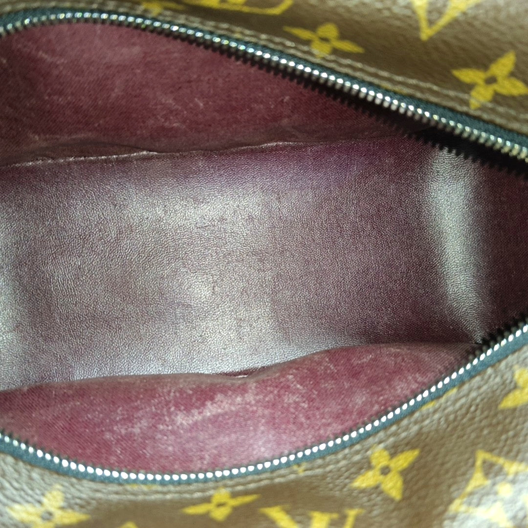 Monogram Coated Canvas Clutch Brown