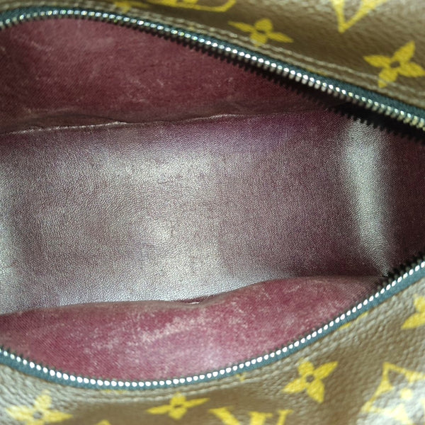 Monogram Coated Canvas Clutch Brown