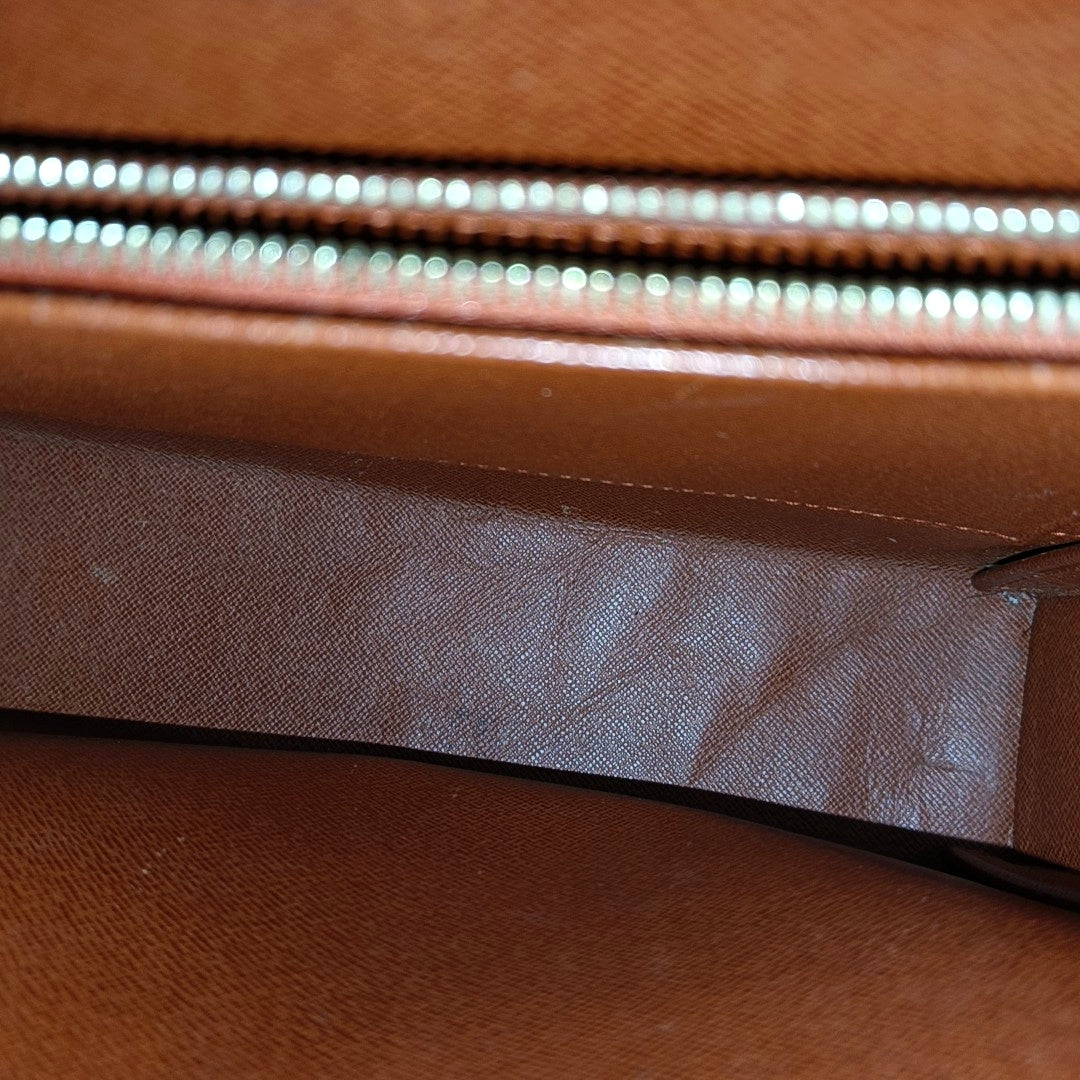 TRIBECA Damier Ebene Coated Canvas Brown
