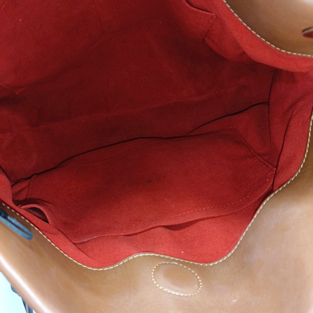 TUILERIES Monogram Coated Canvas Brown