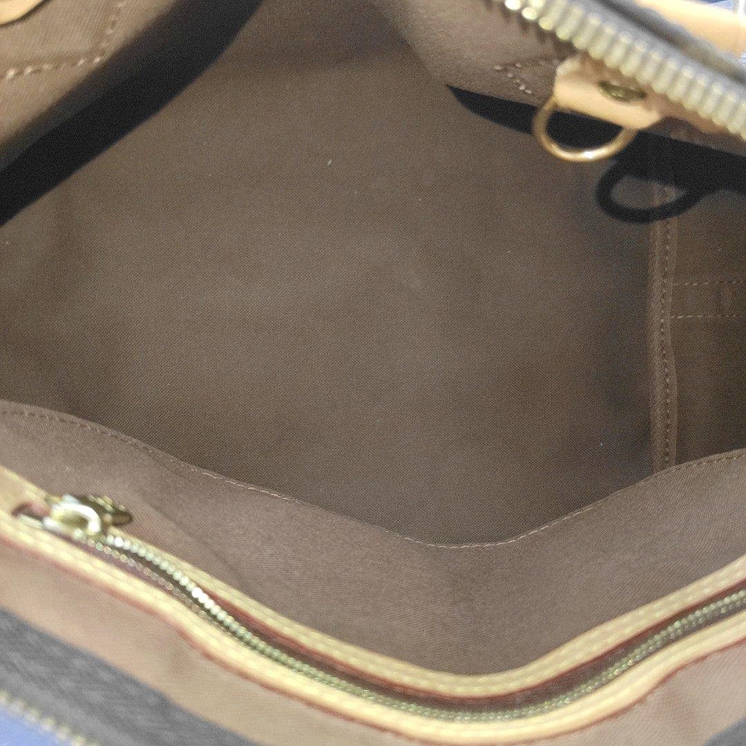 SPEEDY 30 Monogram Coated Canvas Brown