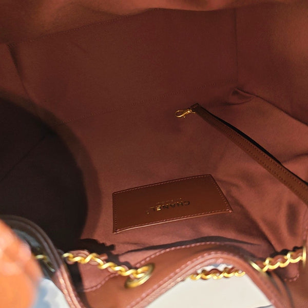 CHANEL 25 Medium Quilted Grained Calfskin Brown