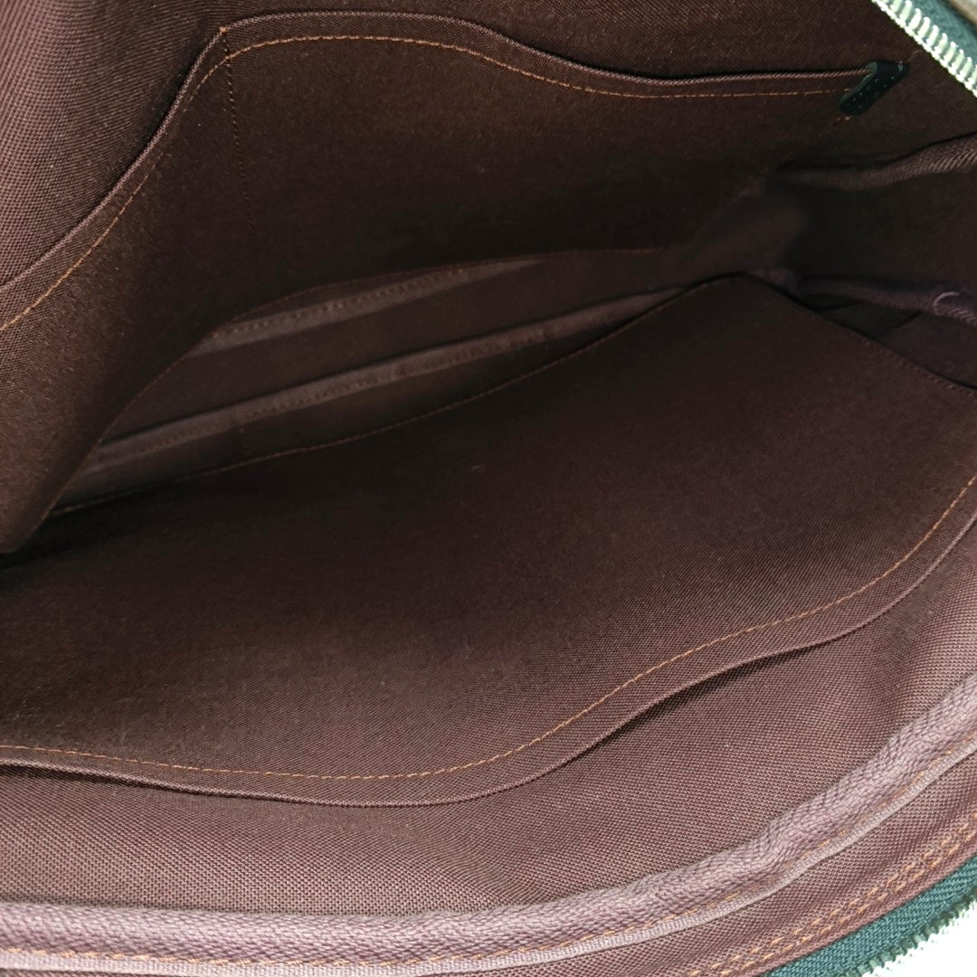 PORTE-DOCUMENTS PM Monogram Coated Canvas Brown
