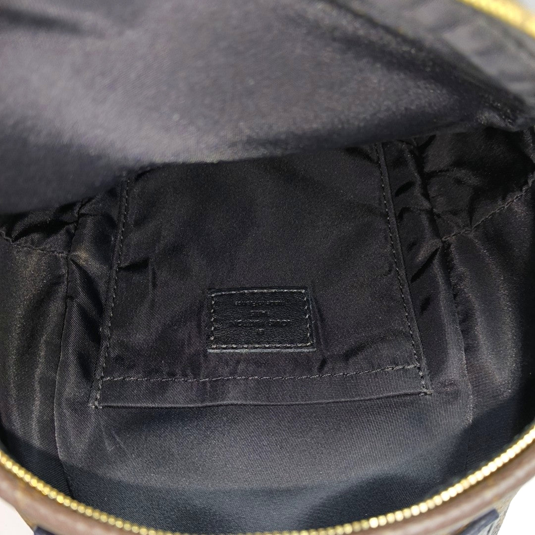 Authenticated pre-owned  PALM SPRINGS Mini Monogram Coated Canvas Brown - Backpack at Looply