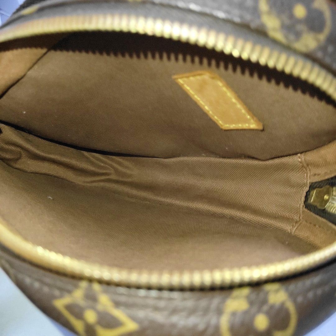 GANGE Monogram Coated Canvas Brown