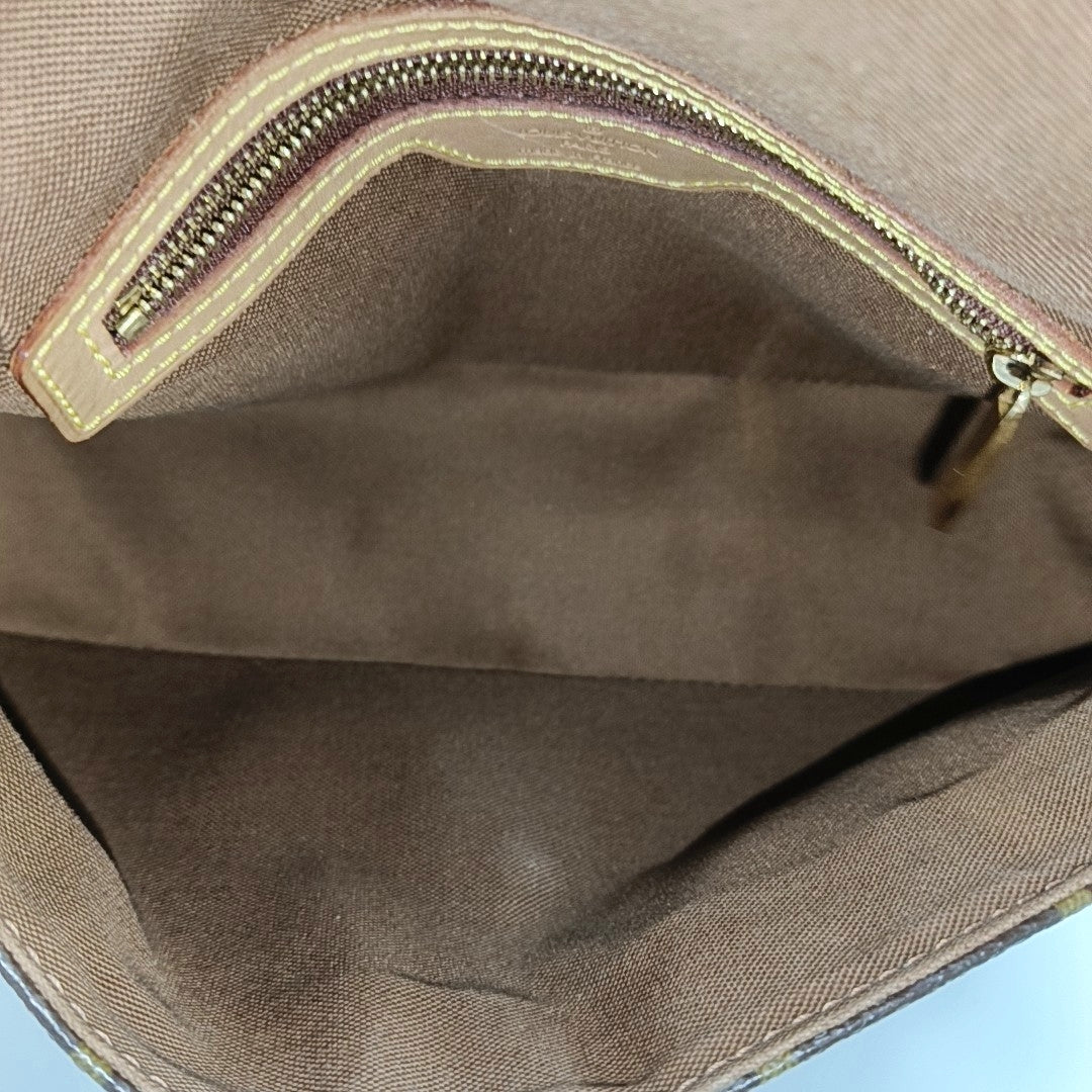 LOOPING PM Monogram Coated Canvas Brown