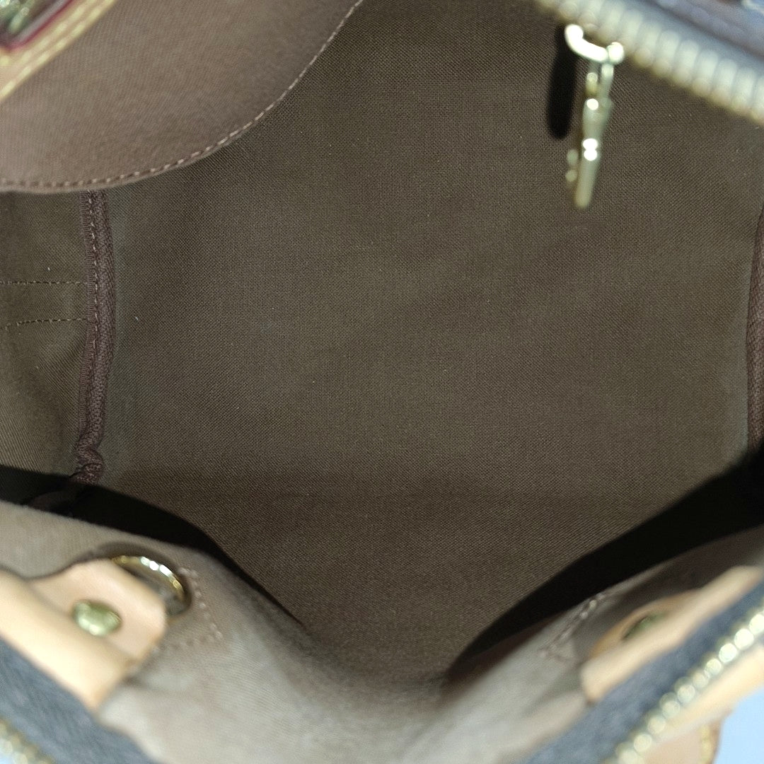 SPEEDY 25 Monogram Coated Canvas Brown