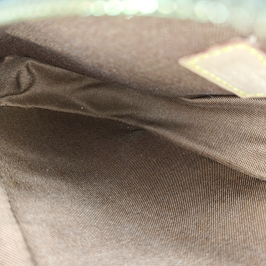 GANGE Monogram Coated Canvas Brown