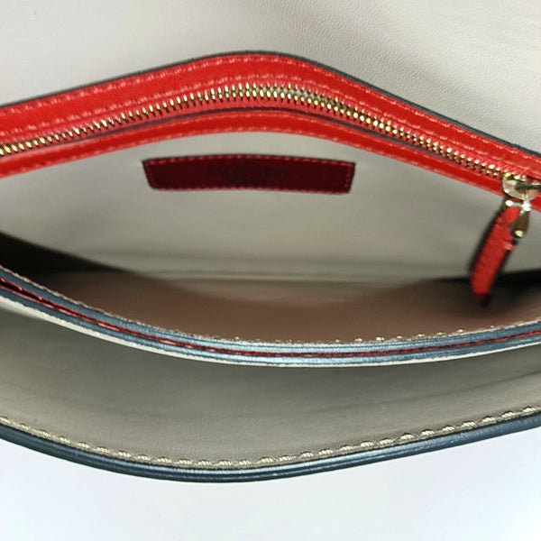 Authenticated pre-owned  Rockstud Lambskin Red - Clutch at Looply