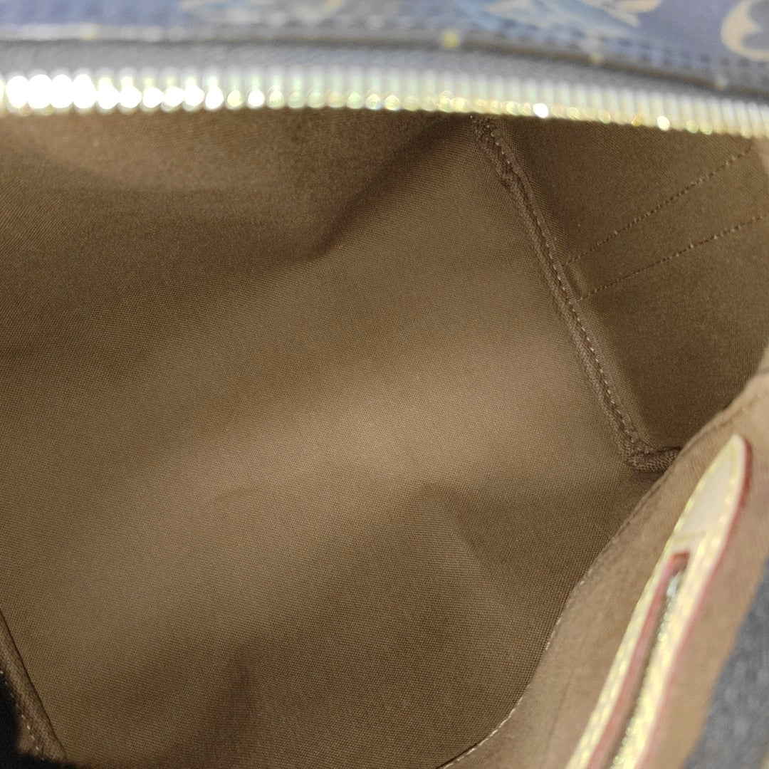 SPEEDY 25 Monogram Coated Canvas Brown