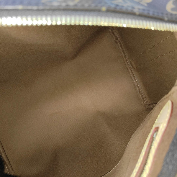 SPEEDY 25 Monogram Coated Canvas Brown
