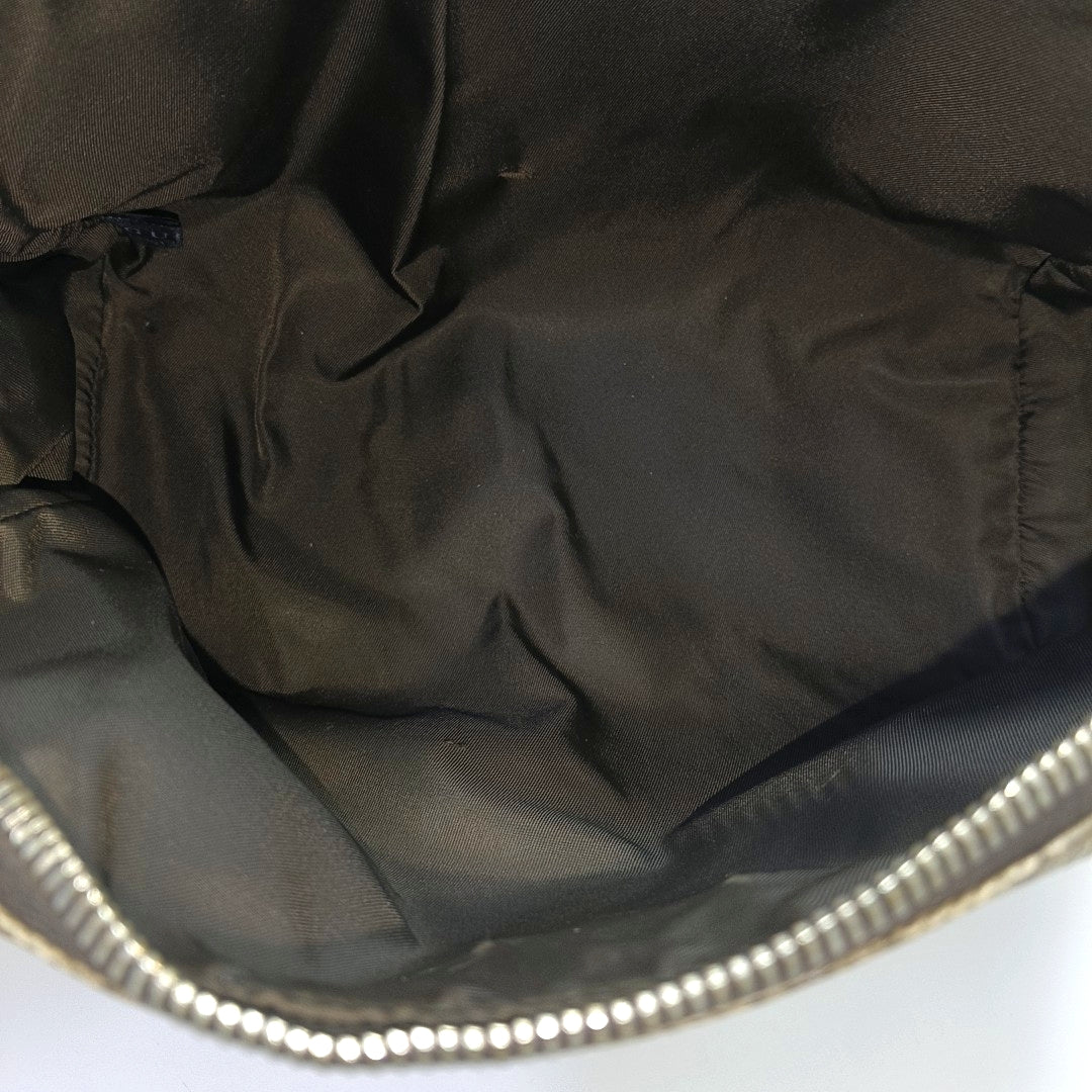 Monogram Coated Canvas Clutch Brown