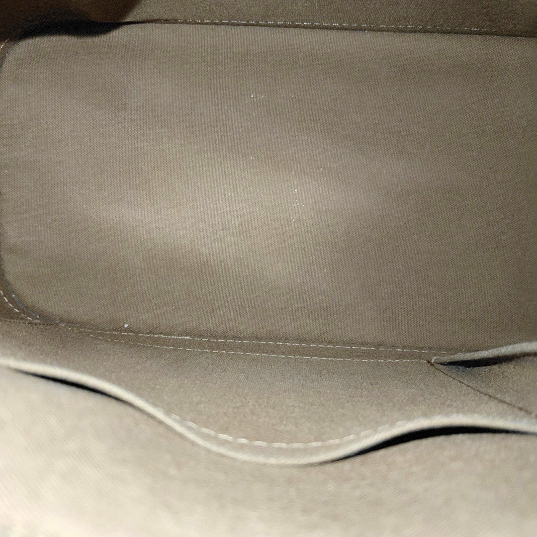 ALMA PM Monogram Coated Canvas Brown