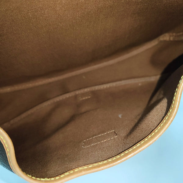 SAUMUR Monogram Coated Canvas Brown