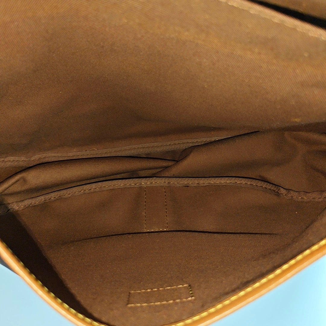 SAUMUR 35 Monogram Coated Canvas Brown