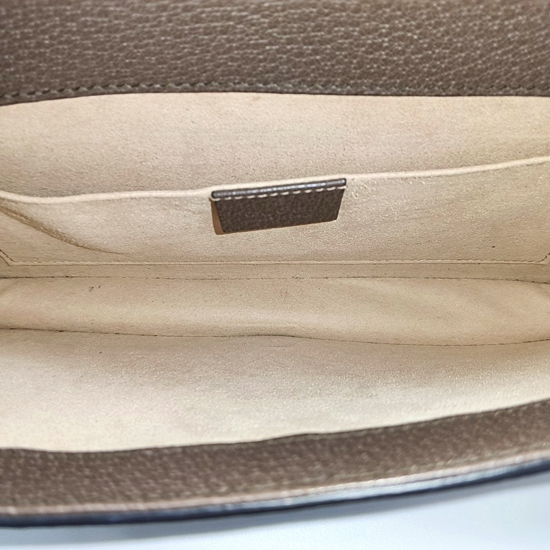 Authenticated pre-owned  Dionysus Monogram Coated Canvas Beige - Clutch at Looply