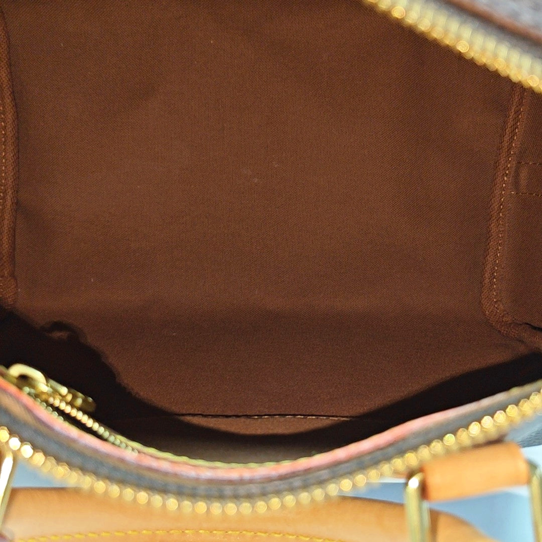 SPEEDY 25 Monogram Coated Canvas Brown