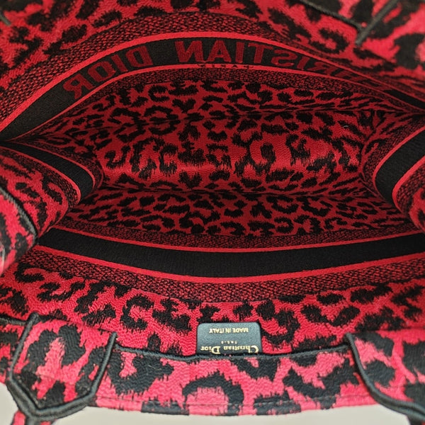 Authenticated pre-owned  Book Tote Medium Fabric Red - Tote Bag at Looply