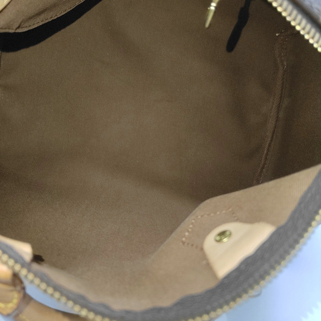 SPEEDY 25 Monogram Coated Canvas Brown