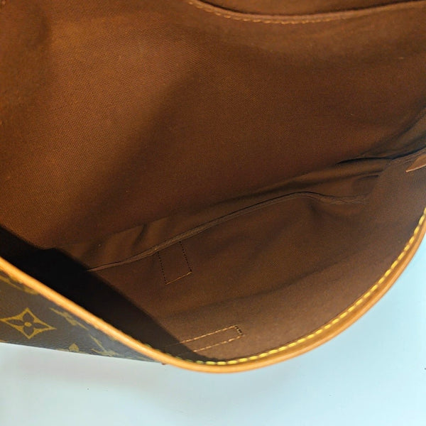 SAUMUR 35 Monogram Coated Canvas Brown