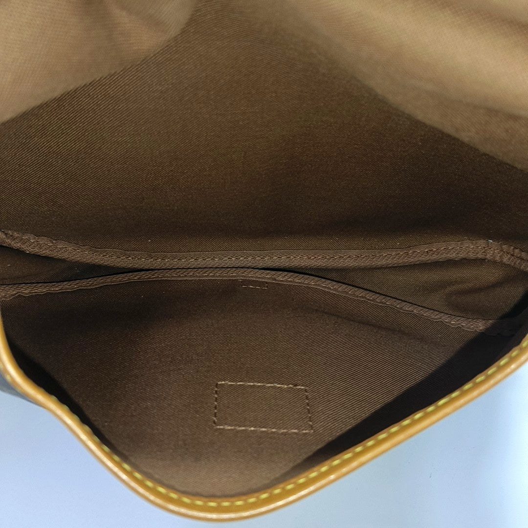 SAUMUR 30 Monogram Coated Canvas Brown