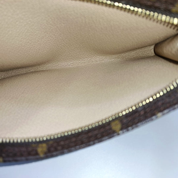 Monogram Coated Canvas Clutch Brown