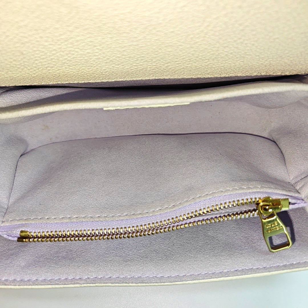 MÉTIS EAST WEST Monogram Calfskin White