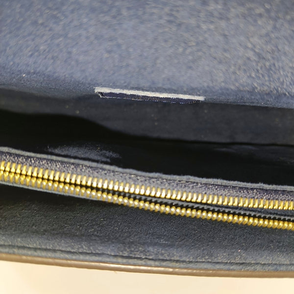VICTOIRE Monogram Coated Canvas Brown