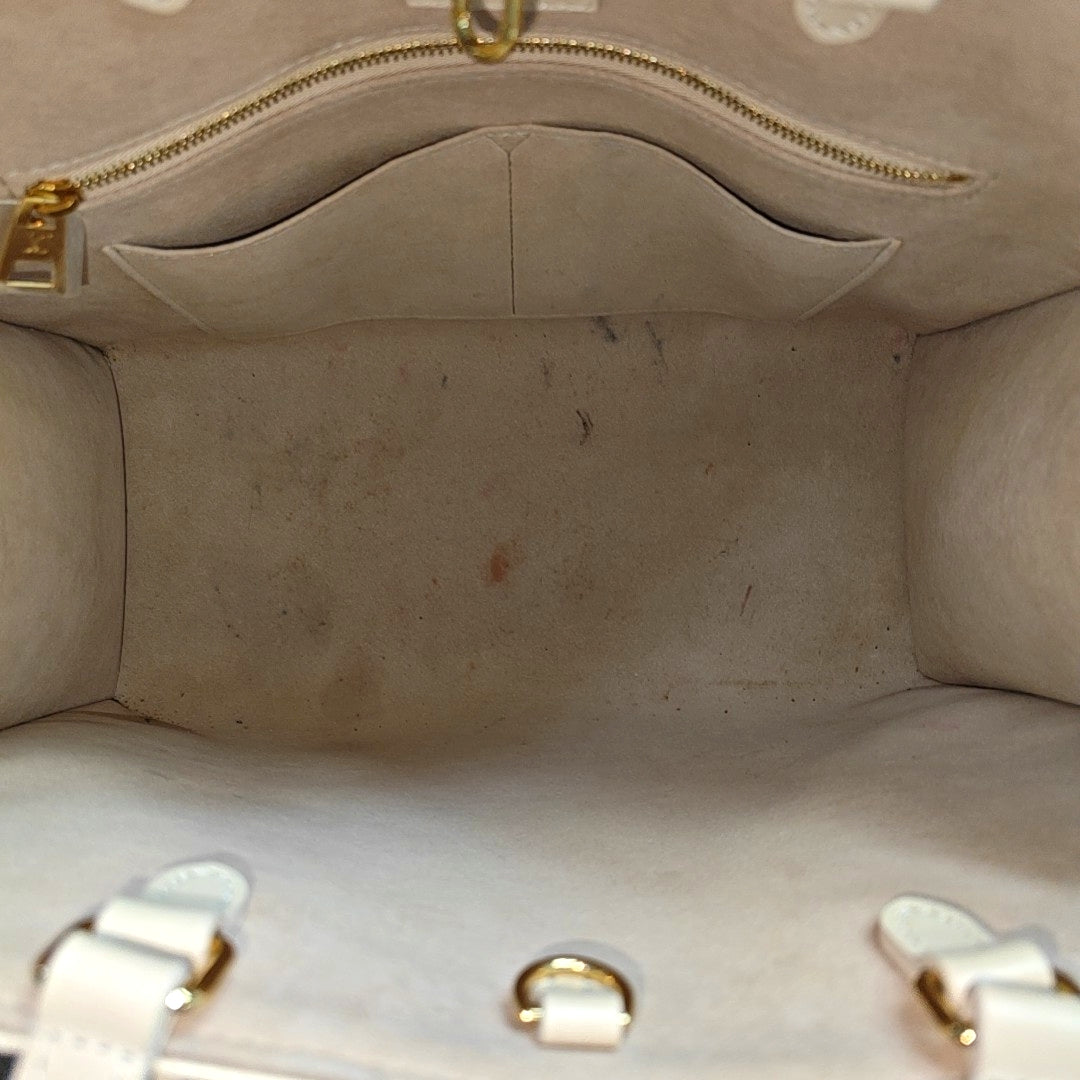 ONTHEGO MM Monogram Calfskin Beige