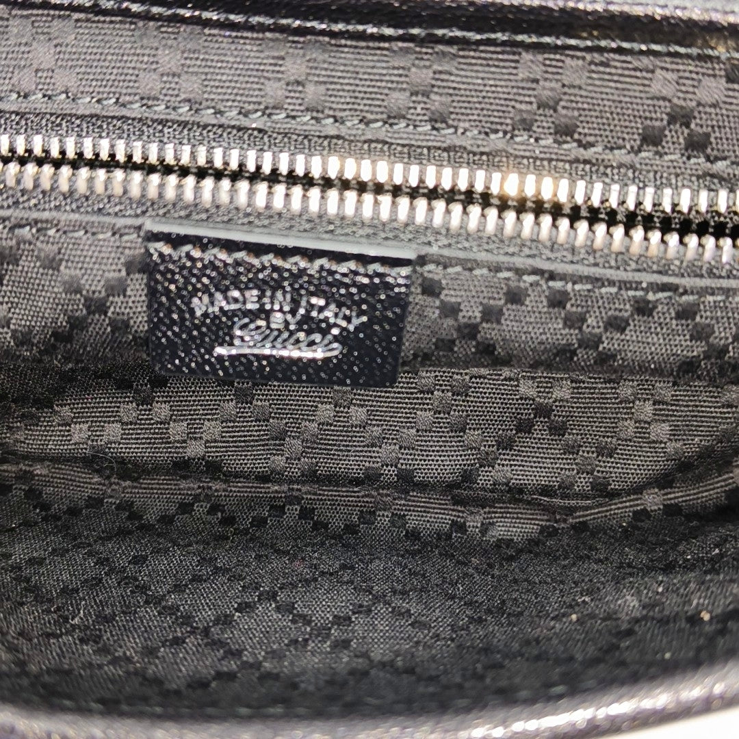 Jackie Small Monogram Canvas Negro