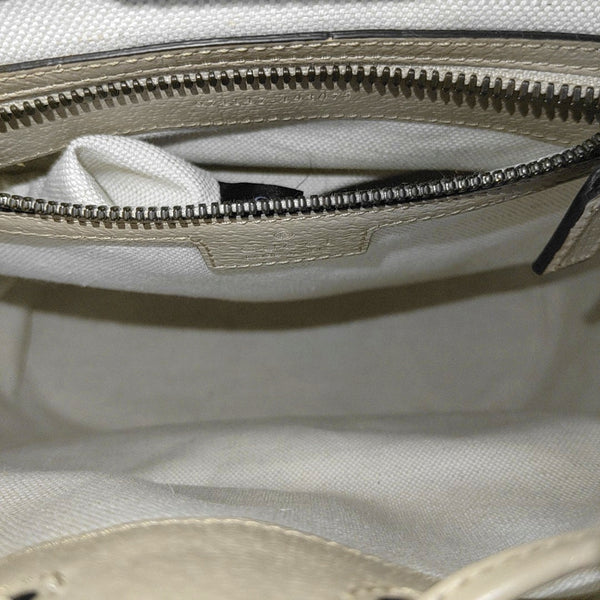 Monogram Coated Canvas Backpack Beige