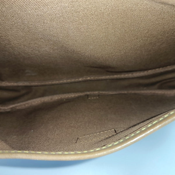 SAUMUR 30 Monogram Coated Canvas Brown
