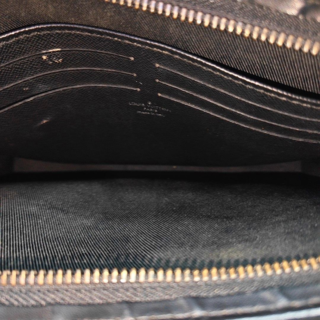 Pochette Voyag MM Monogram Coated Canvas Black