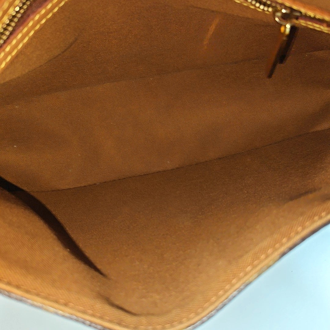 LOOPING PM Monogram Coated Canvas Brown