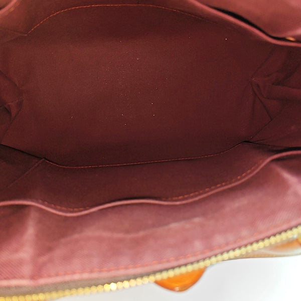 RIVOLI MM Monogram Coated Canvas Brown