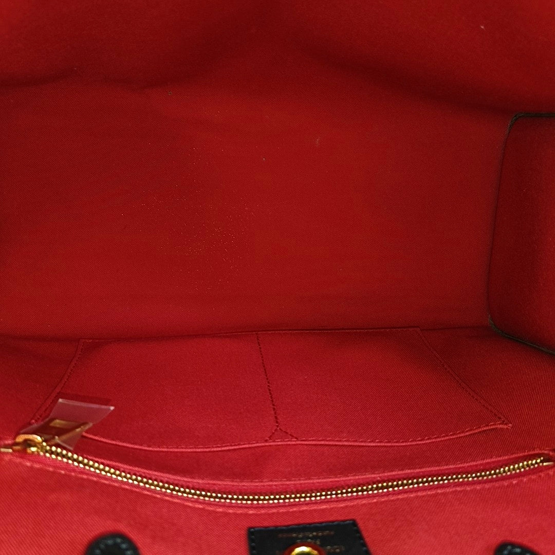 ONTHEGO MM Monogram Coated Canvas Brown