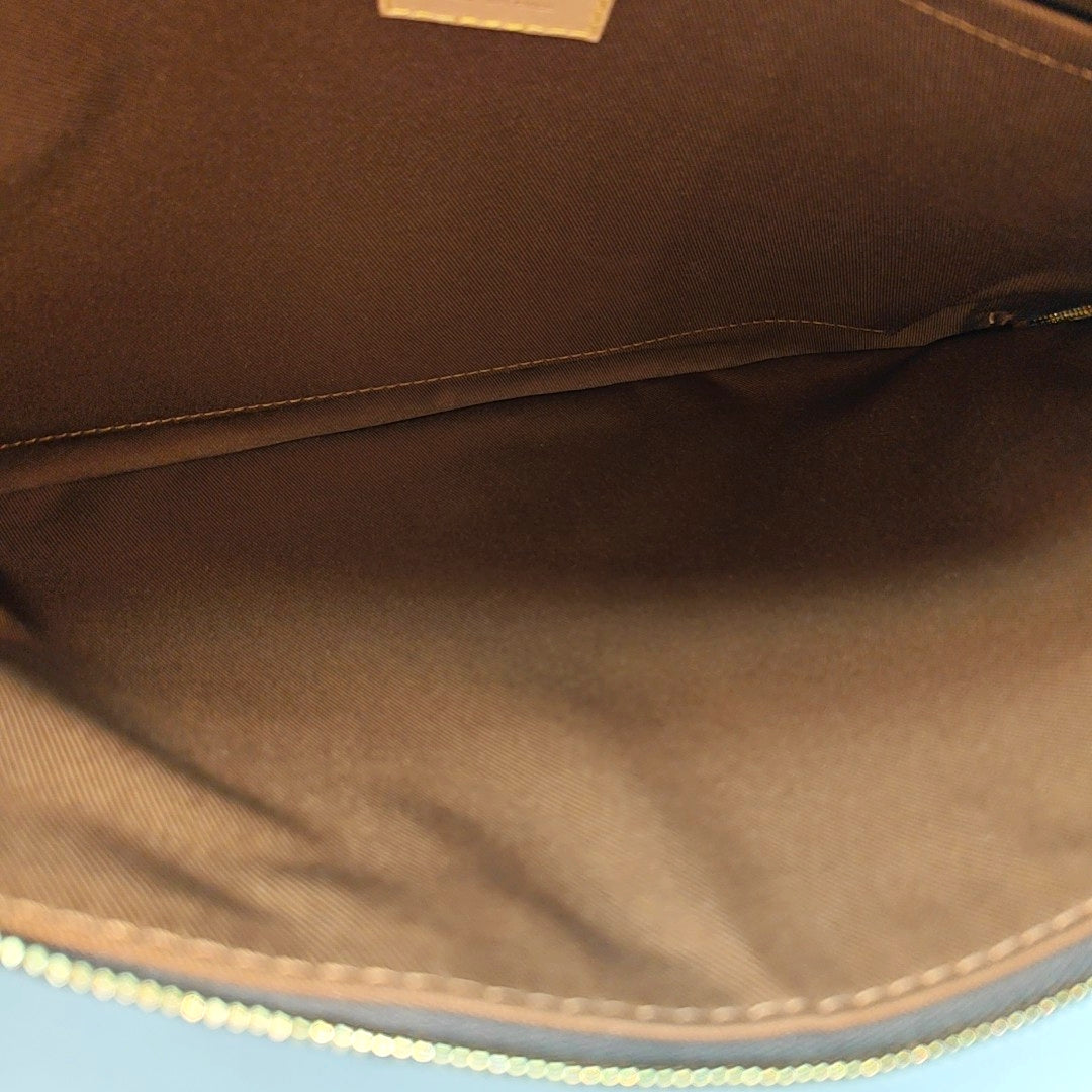 Etui Voyage MM Monogram Coated Canvas Brown