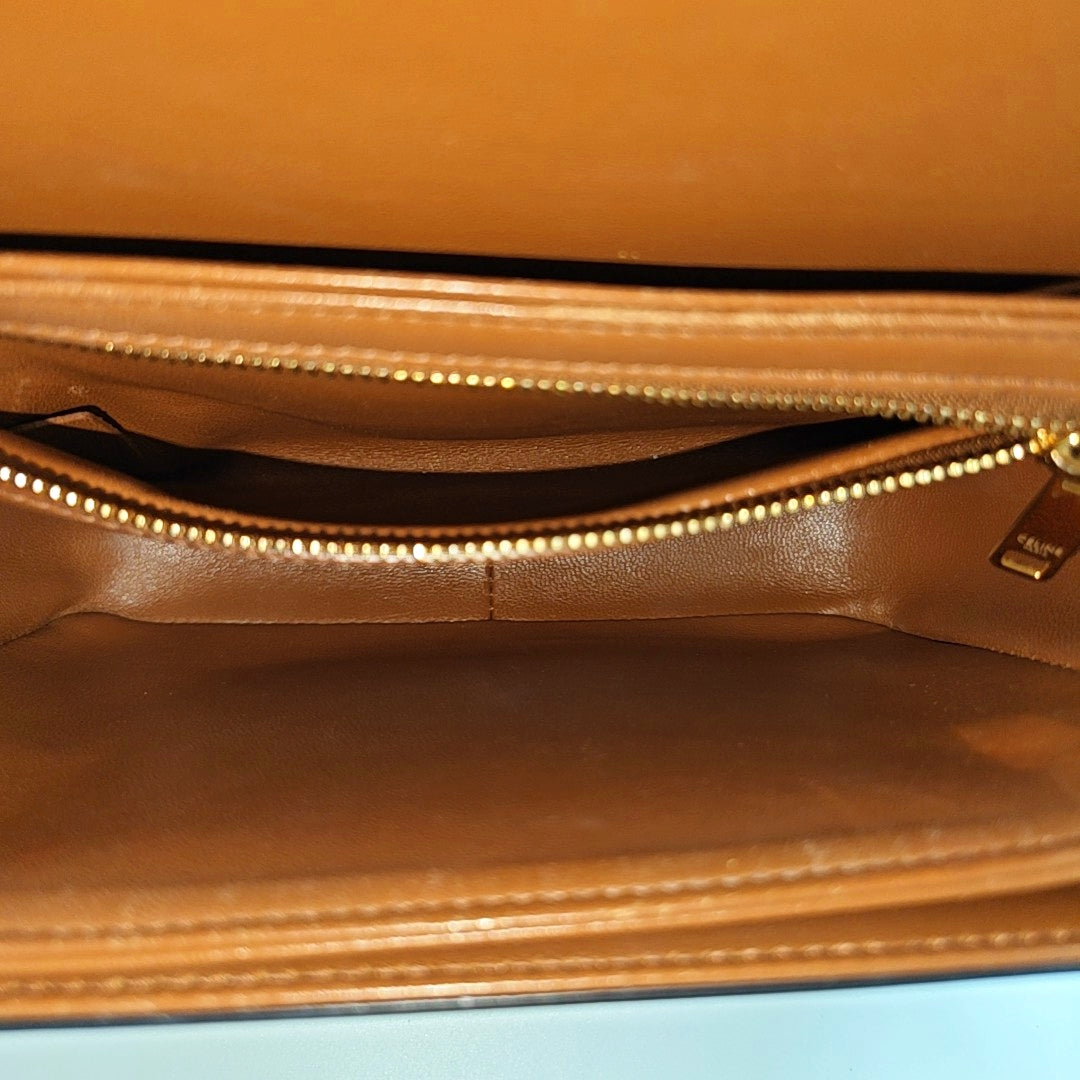 TRIOMPHE Small Coated Canvas Brown