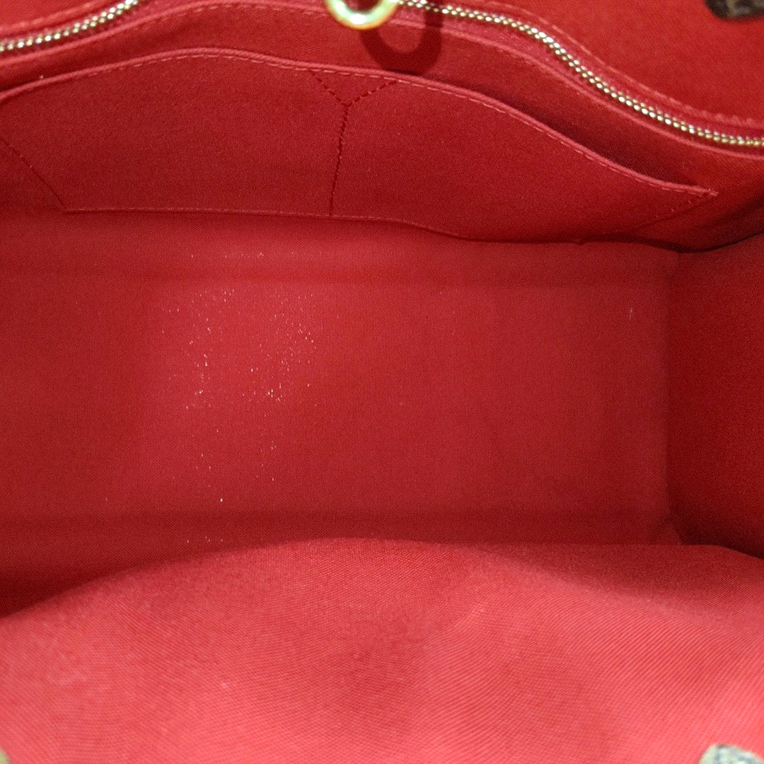 ONTHEGO MM Monogram Coated Canvas Brown