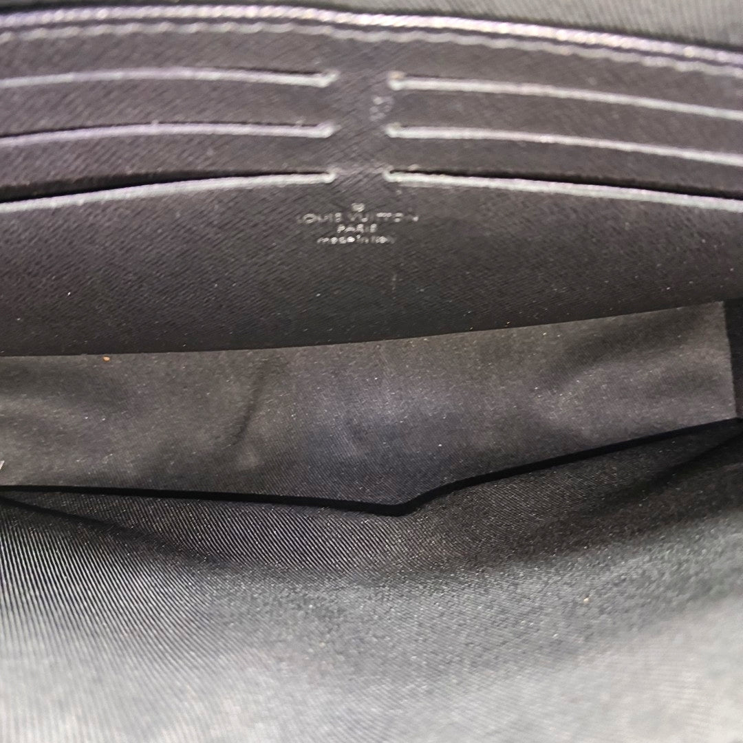 Pochette Voyag MM Monogram Coated Canvas Gray