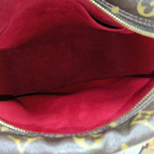 EXCENTRI-CITE Monogram Coated Canvas Brown