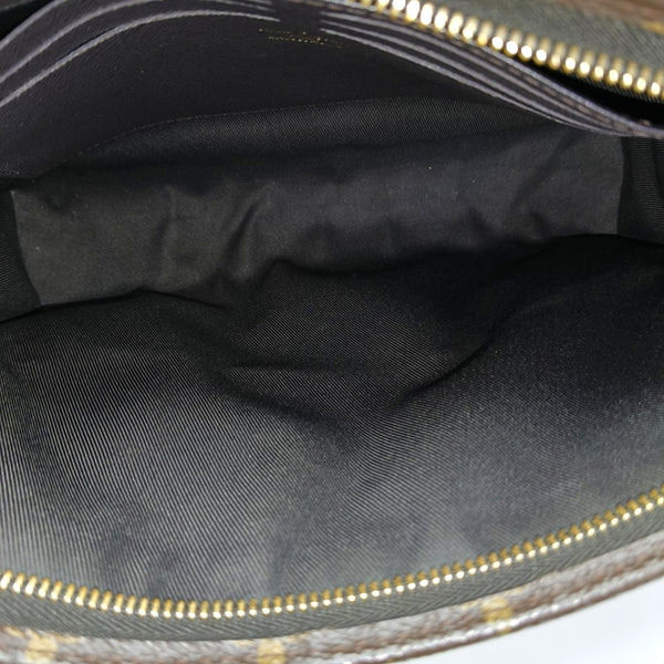 Pochette Voyag MM Monogram Coated Canvas Blue
