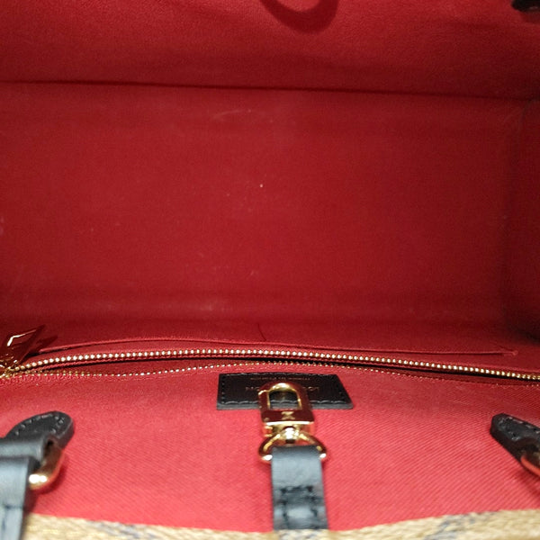ONTHEGO MM Monogram Coated Canvas Brown