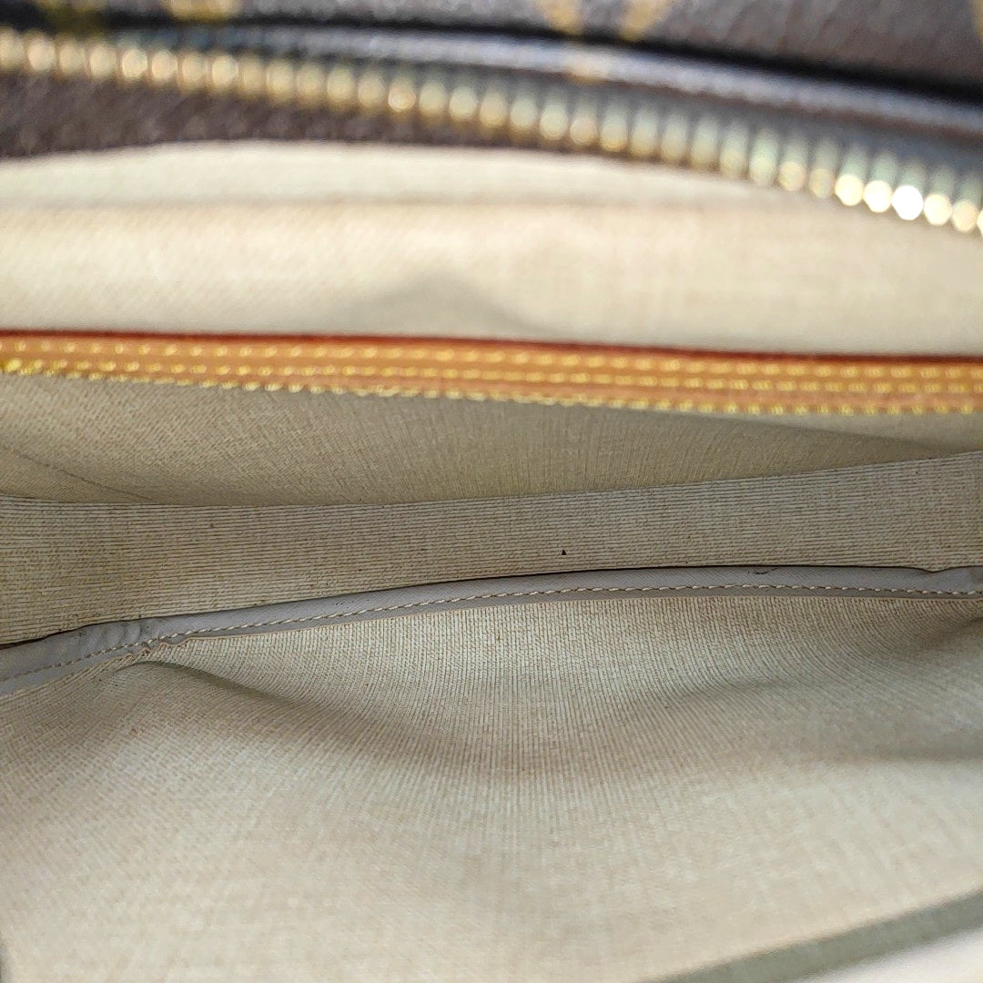 REPORTER Monogram Coated Canvas Brown