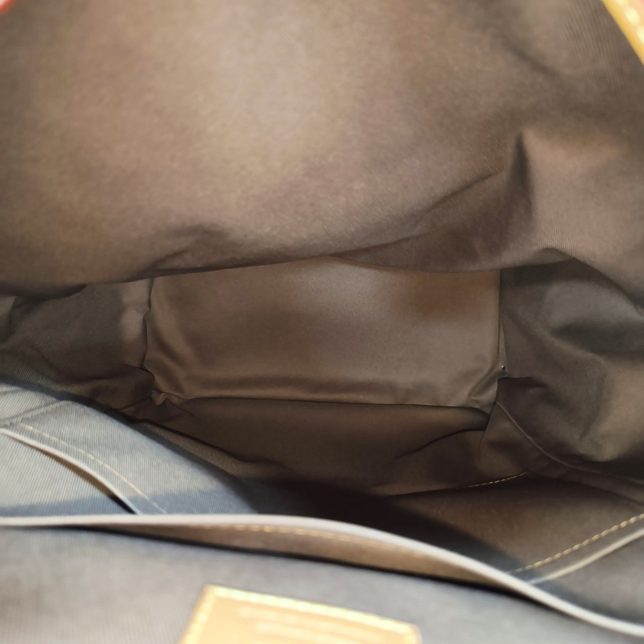 TRIO Monogram Coated Canvas Brown