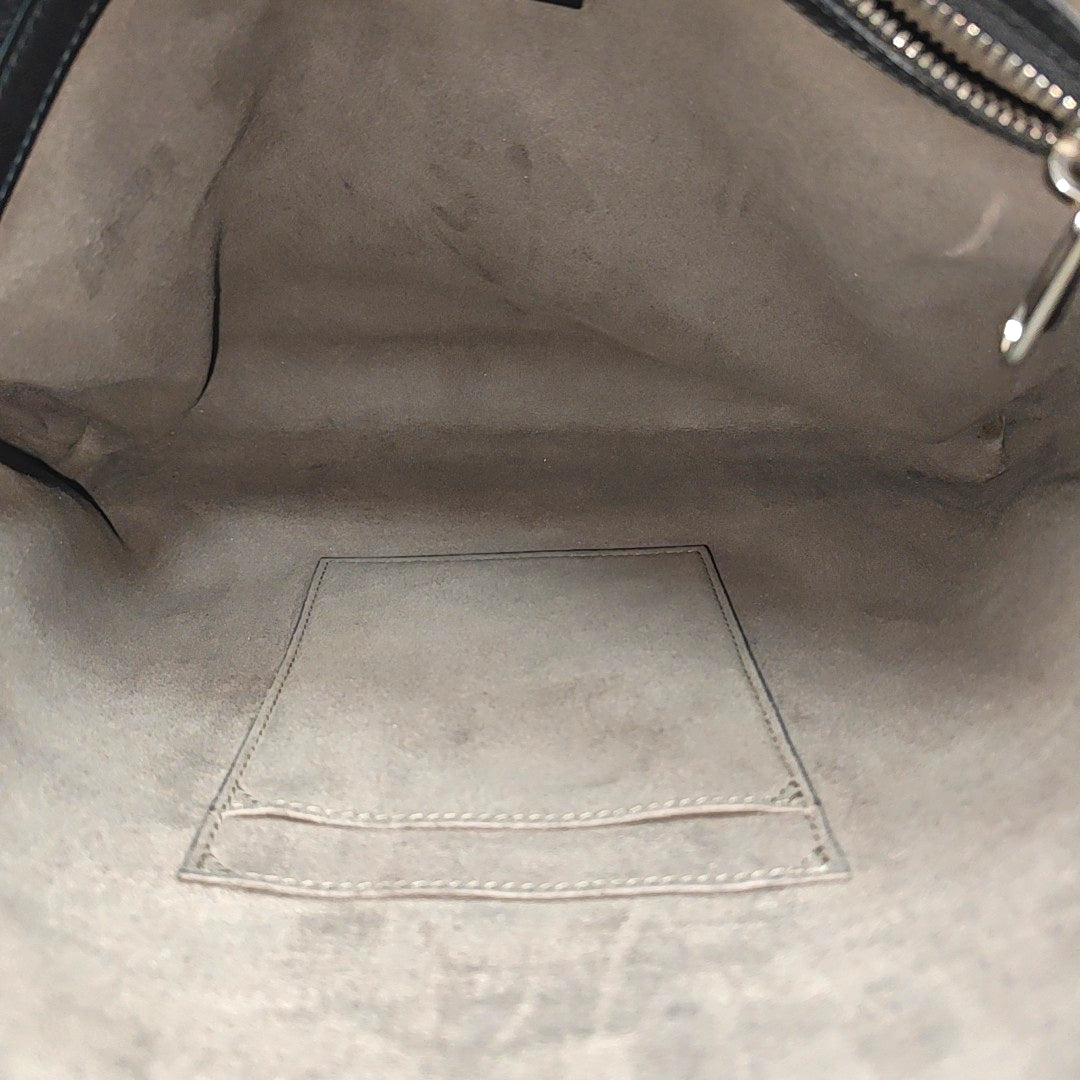Monogram Coated Canvas Clutch Brown