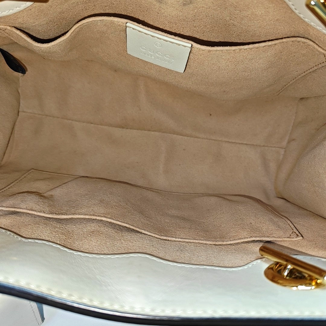 Padlock Small Monogram Coated Canvas Beige
