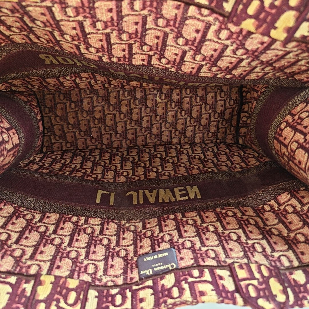 Authenticated pre-owned  Book Tote Large Monogram Canvas Red - Tote Bag at Looply