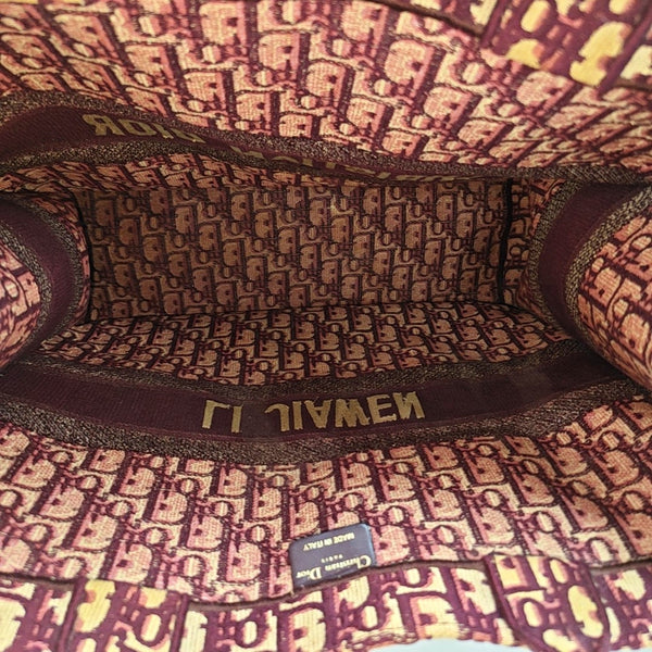 Authenticated pre-owned  Book Tote Large Monogram Canvas Red - Tote Bag at Looply
