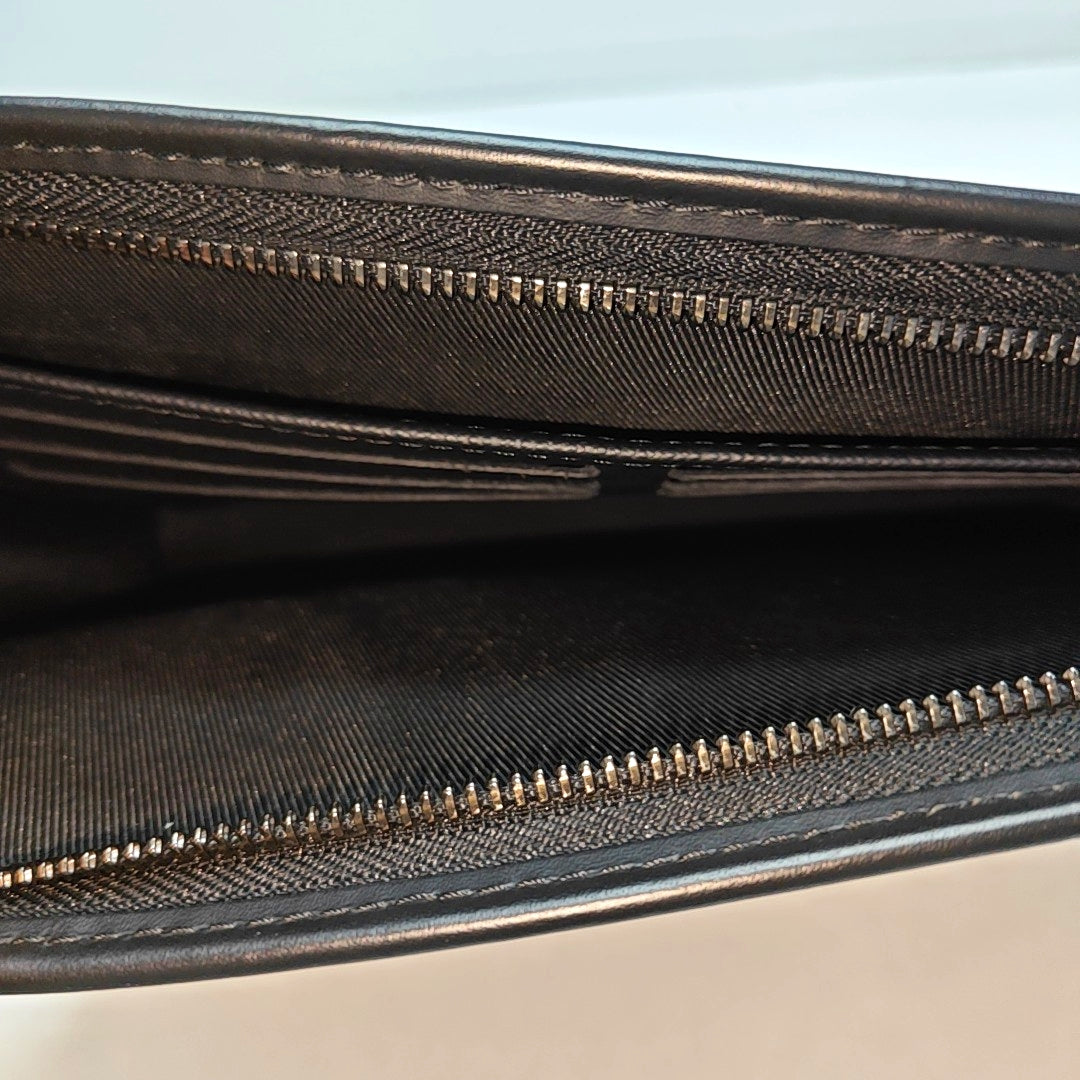 Pochette Voyag MM Monogram Coated Canvas Black